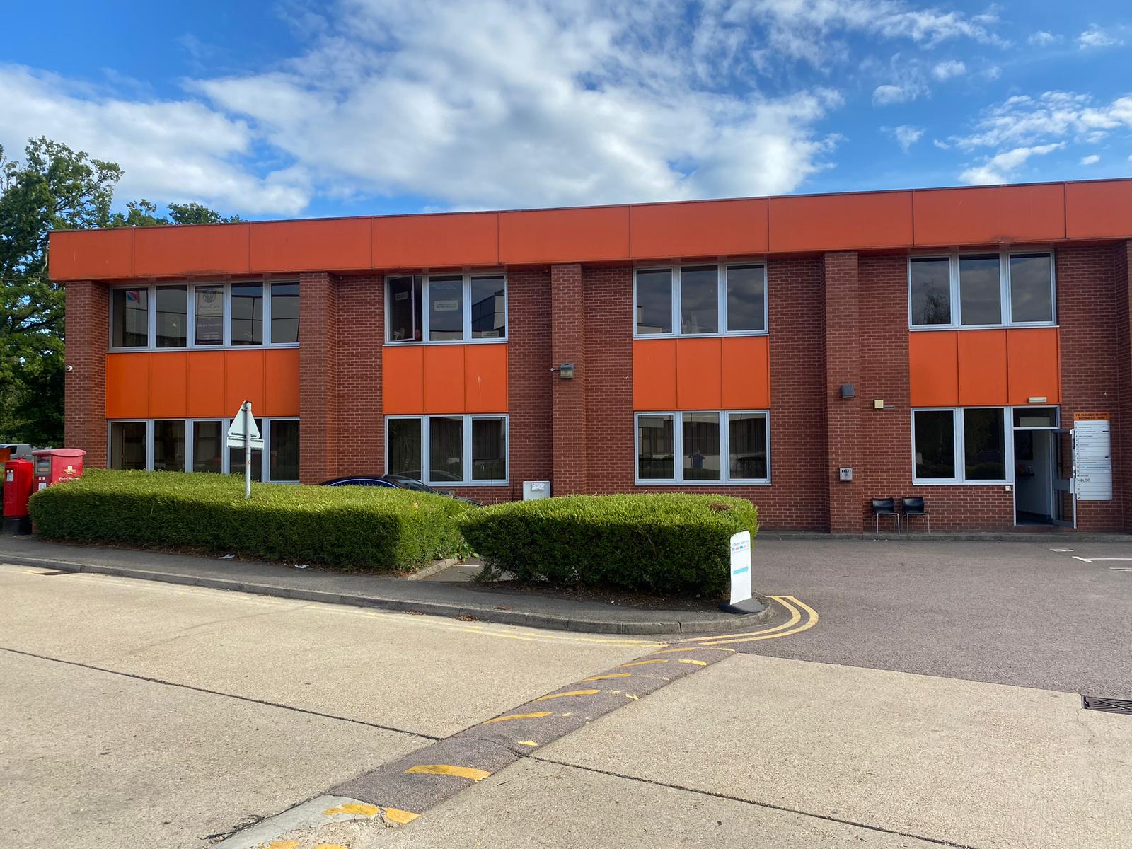 image showing office building after spray services on the windows.